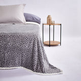 Manta sherpa animal print gris
