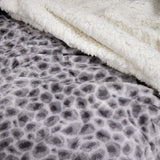 Manta sherpa animal print gris