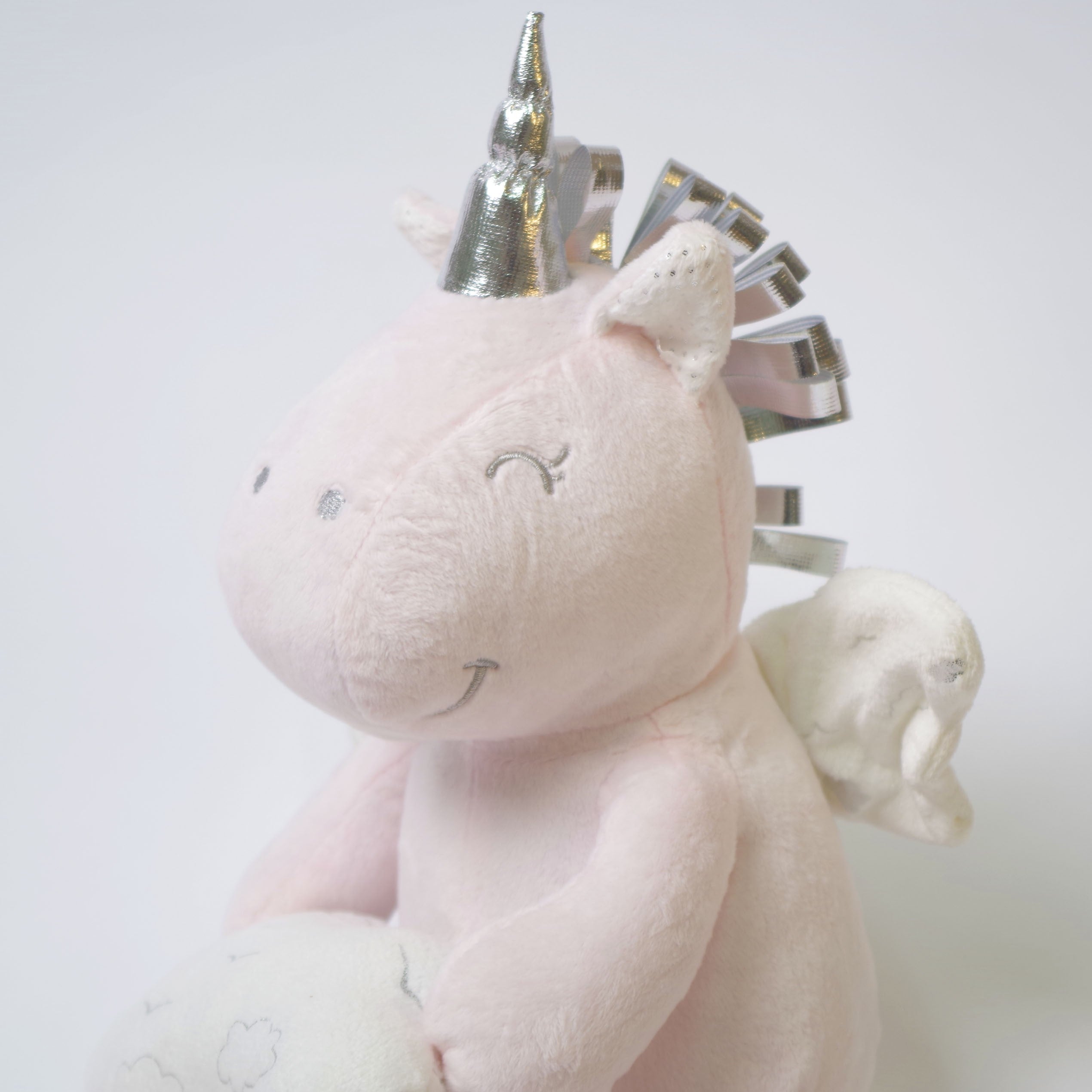 Manta + unicornio de peluche rosa