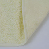 Pack 3 baberos rizo guardería color amarillo con elástico. Lavables, exterior de rizo y reverso impermeable. Medidas: 33x29cm