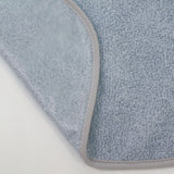 Babero rizo plastico con goma azul hielo
