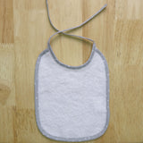 Babero rizo liso blanco/gris 25x30