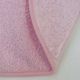Pack 3 baberos rizo guardería color rosa con elástico. Lavables, exterior de rizo y reverso impermeable. Medidas: 33x29cm